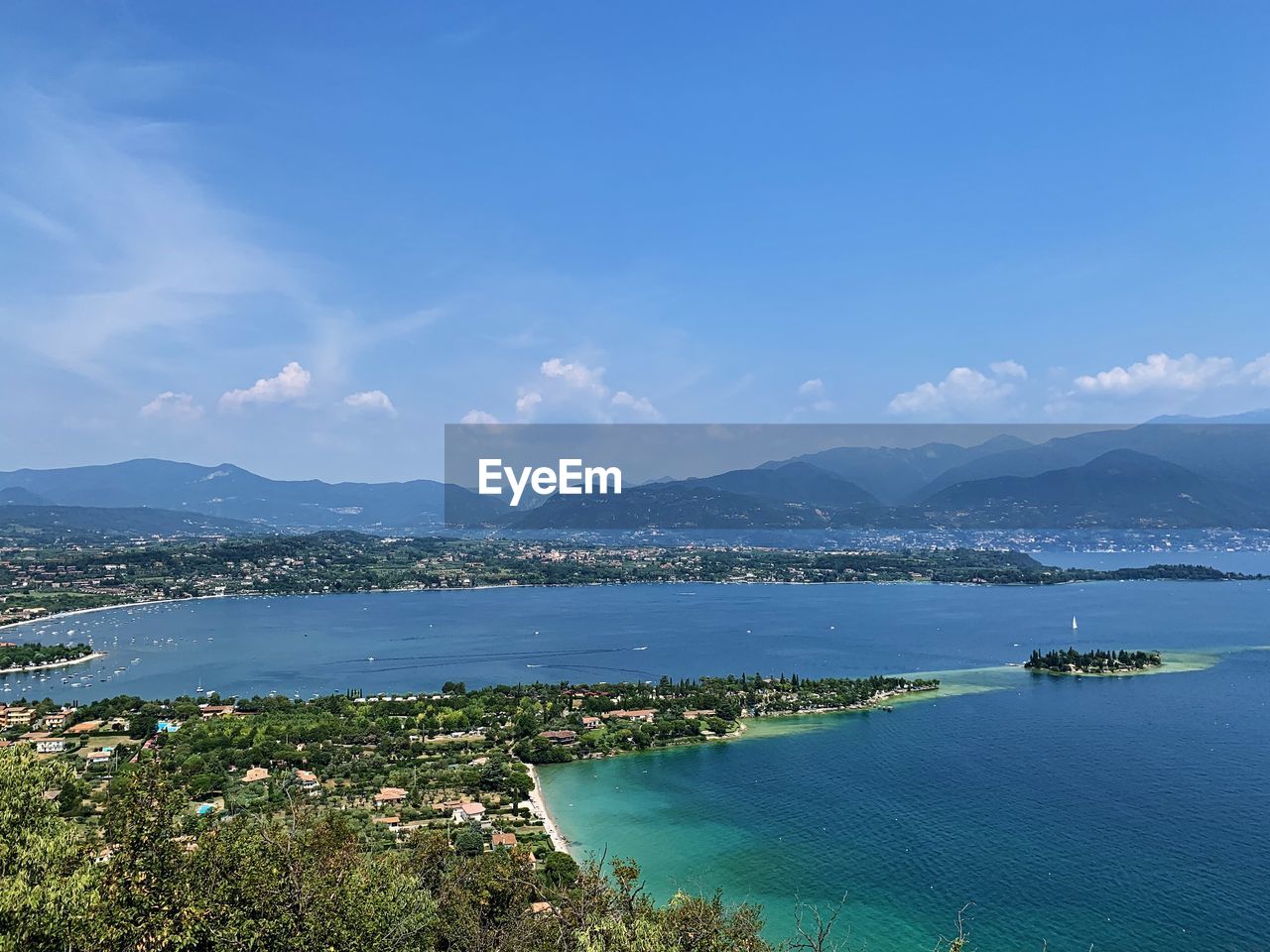 scenic view of sea against blue sky