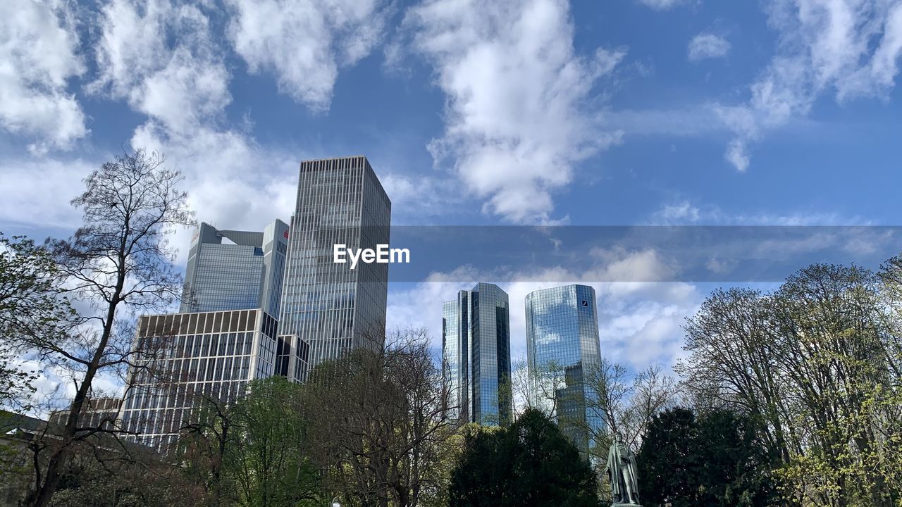 Low angle view of skyscrapers against sky 