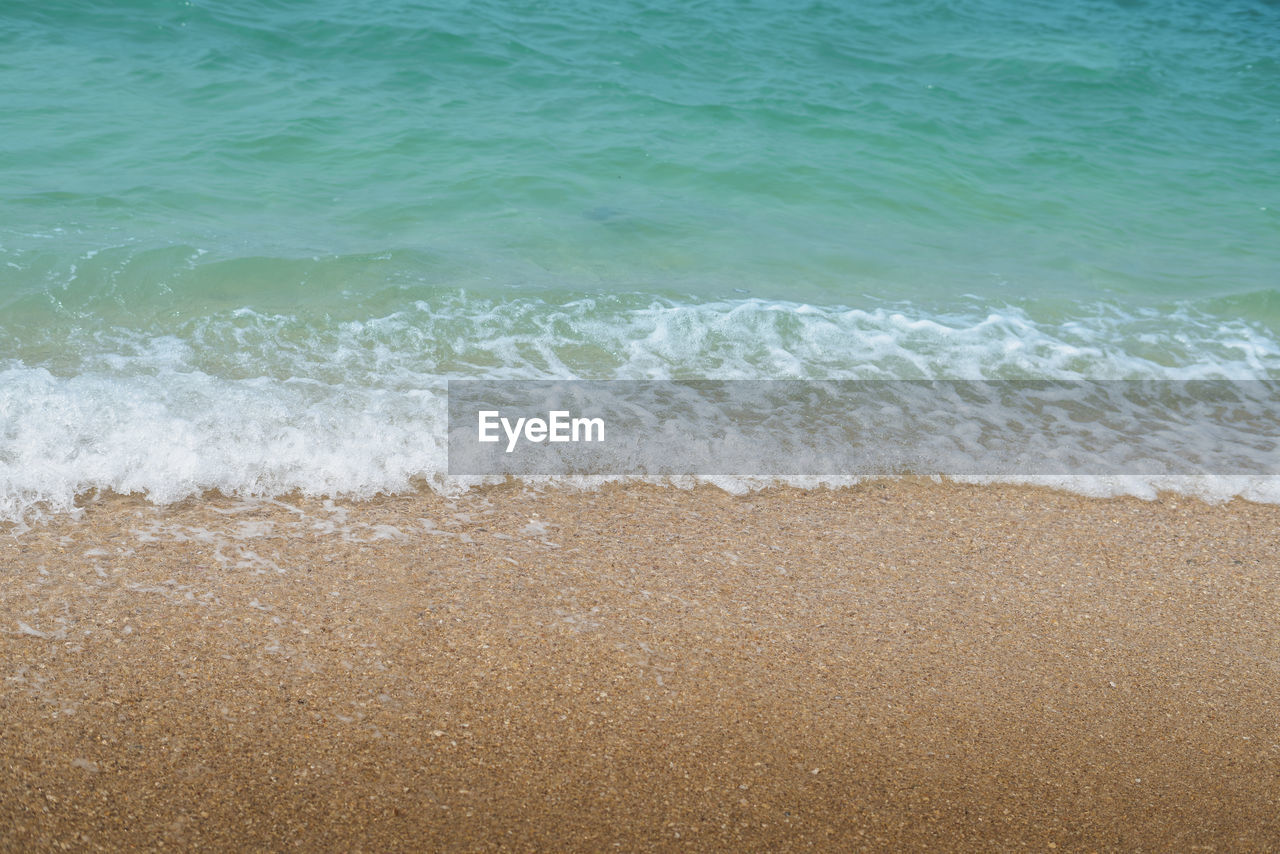 High angle view of surf on beach