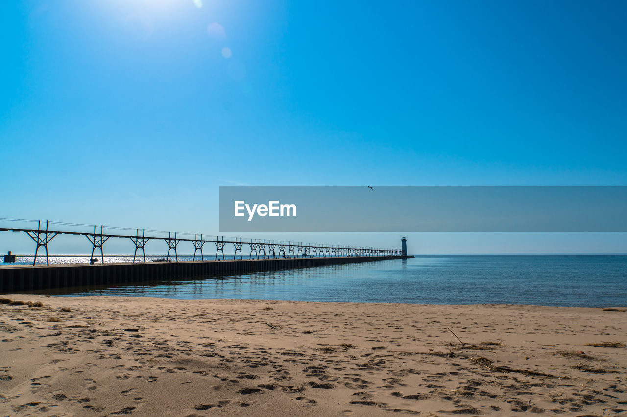 VIEW OF BEACH AGAINST SKY