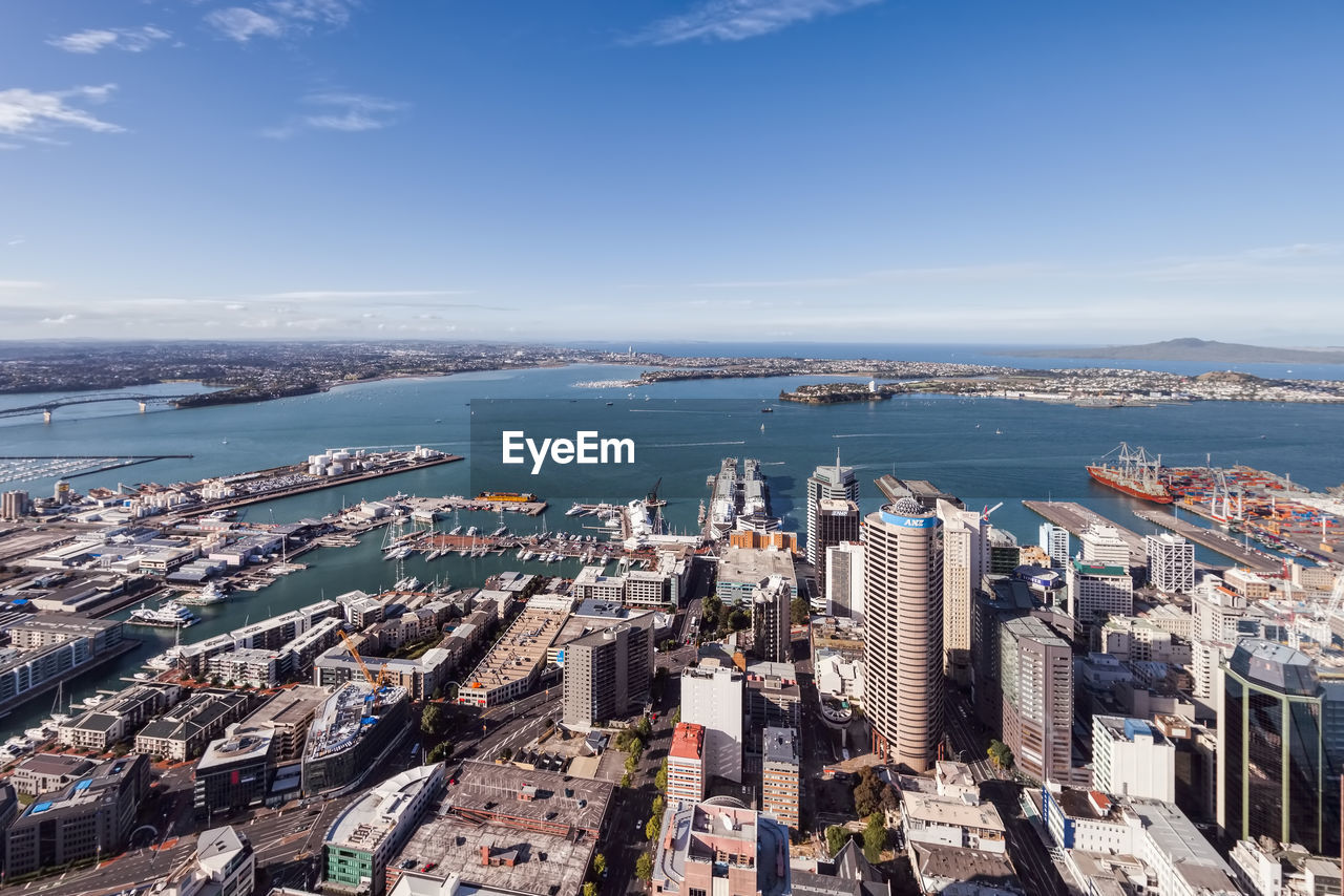 HIGH ANGLE VIEW OF BUILDINGS AGAINST SKY