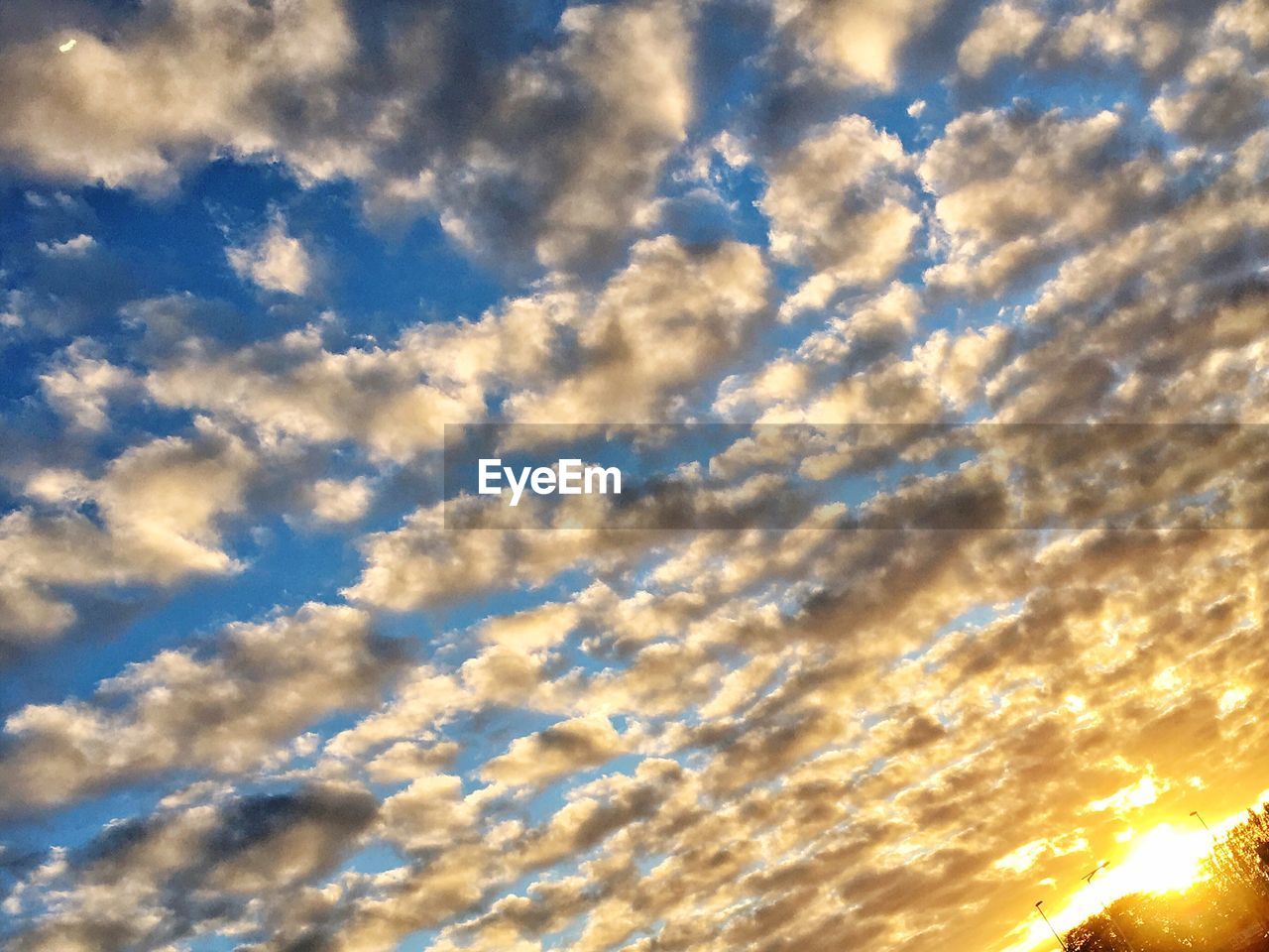 LOW ANGLE VIEW OF CLOUDY SKY DURING SUNSET