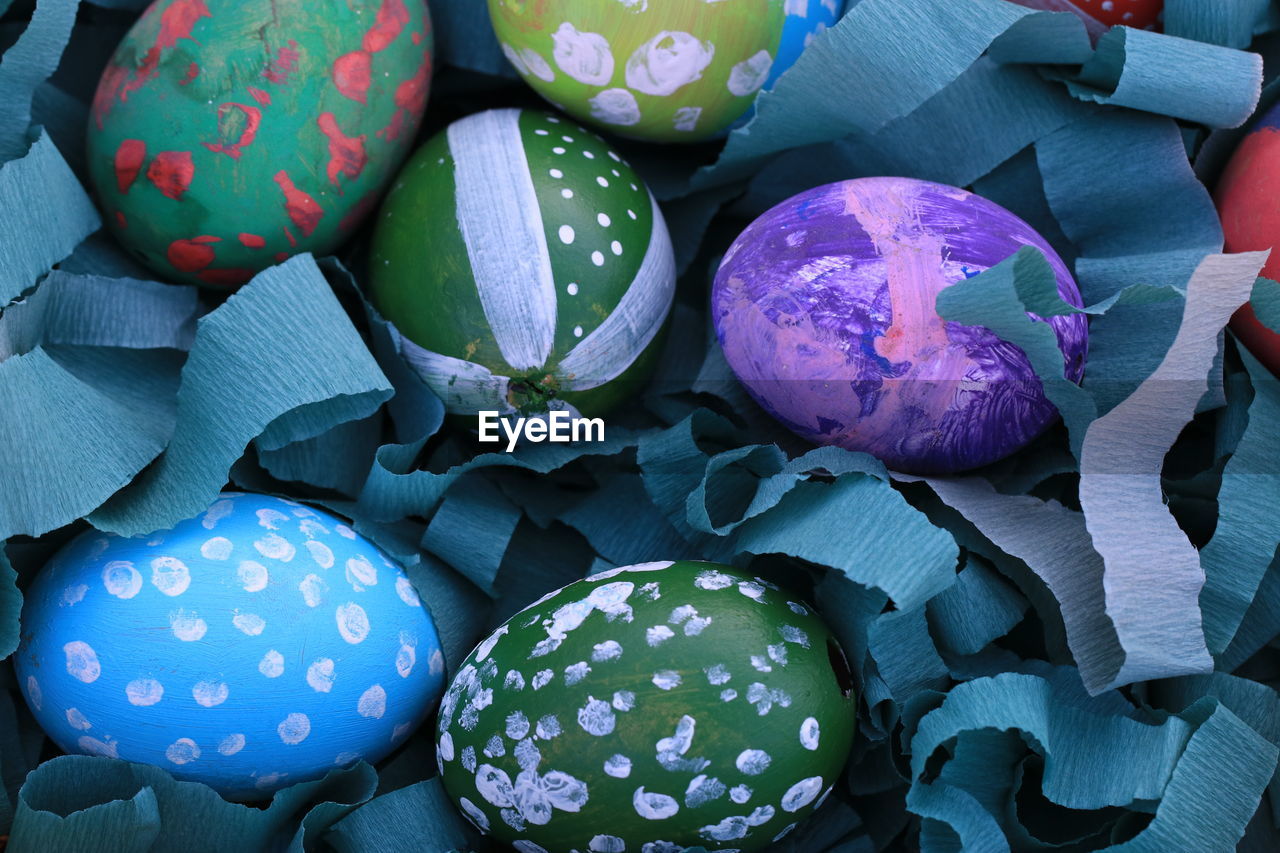 High angle view of multi colored easter eggs for sale