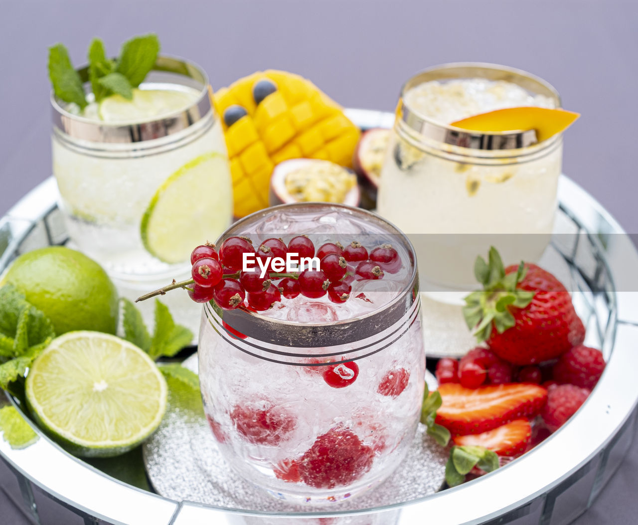 CLOSE-UP OF FRUITS SERVED IN GLASS