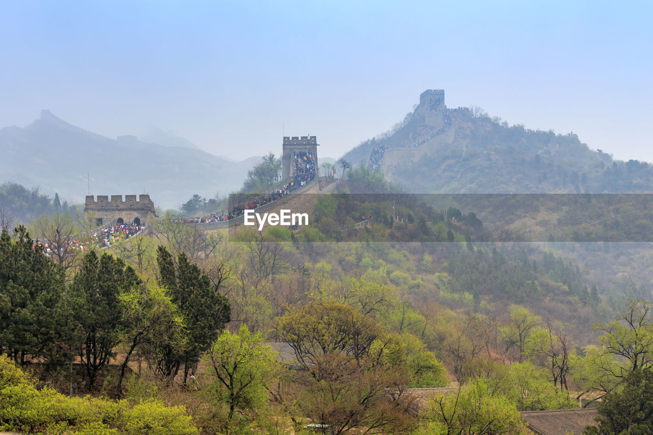 Scenic view of mountains against clear sky at great wall in badaling china