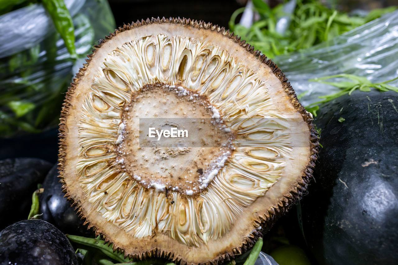 Half cut jackfruit at vegetable store for sale at evening