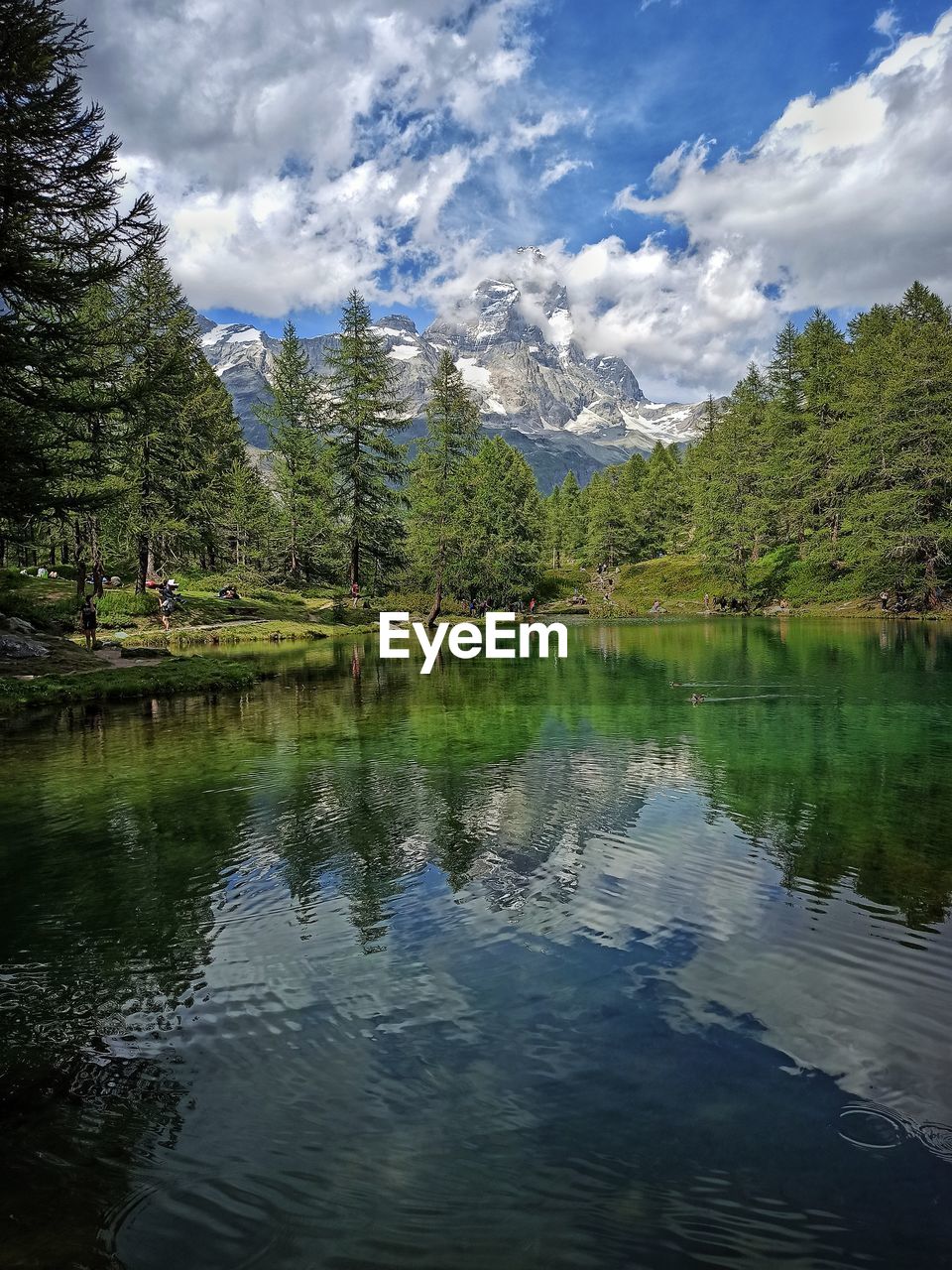 SCENIC VIEW OF LAKE WITH REFLECTION AGAINST SKY