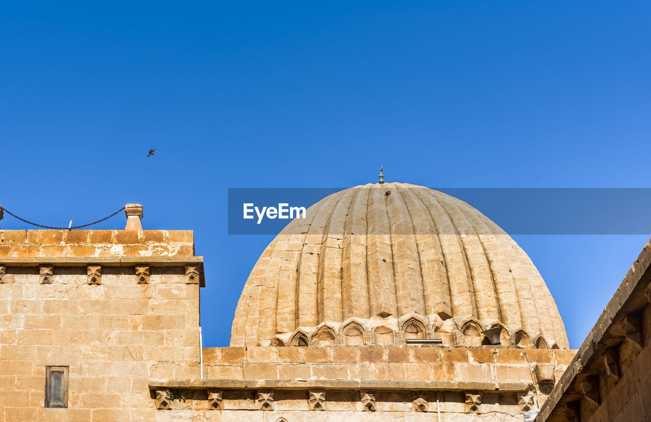 CATHEDRAL AGAINST CLEAR BLUE SKY