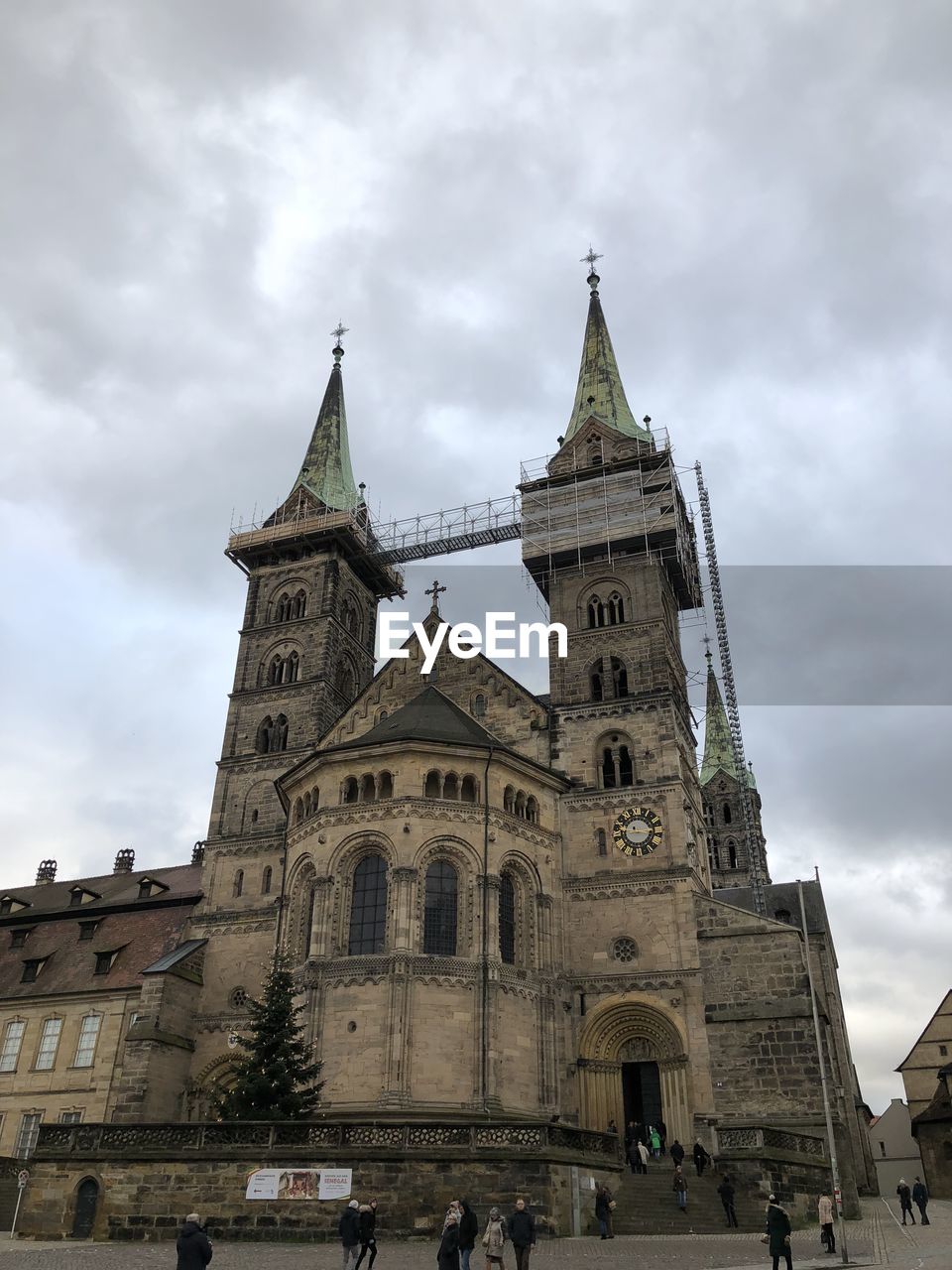 architecture, cloud, sky, built structure, building exterior, nature, history, the past, travel destinations, low angle view, city, travel, building, no people, day, outdoors, tower, landmark, tourism, religion, vehicle