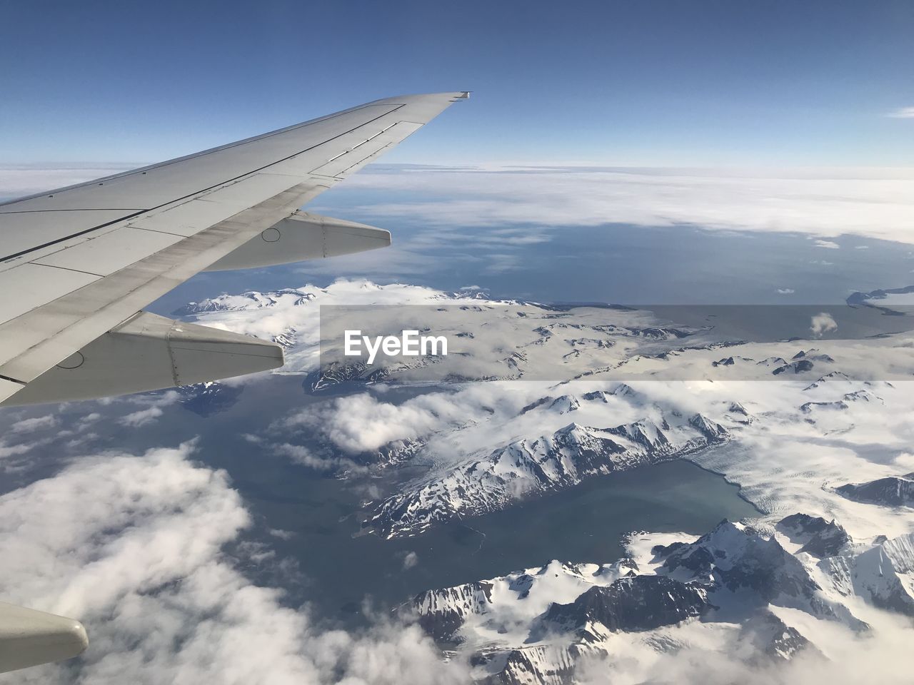 AERIAL VIEW OF MOUNTAIN AGAINST SKY