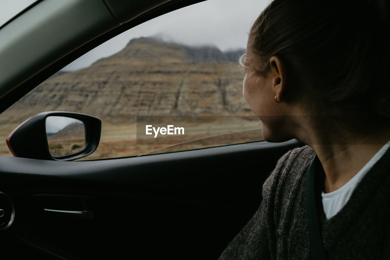 Woman in the car looking out of the window