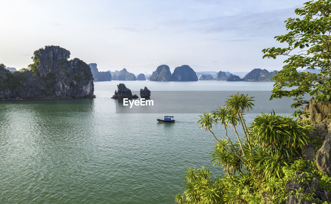 Scenic view of bay against sky