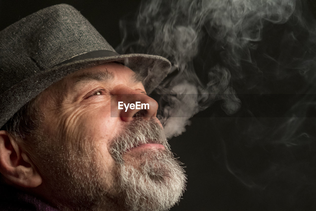 Portrait of man wearing hat