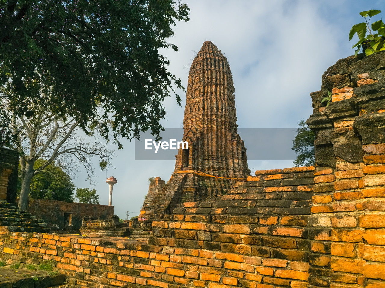 architecture, temple - building, history, religion, built structure, the past, travel destinations, ancient, travel, belief, brick, spirituality, building, old ruin, nature, tourism, business finance and industry, culture, building exterior, landmark, temple, construction industry, ancient history, historic site, place of worship, industry, ruins, old, landscape, rock, stone material, sky, outdoors, no people, tree, ancient civilization, environment, pagoda, plant, arriving, vacation, trip, archaeological site