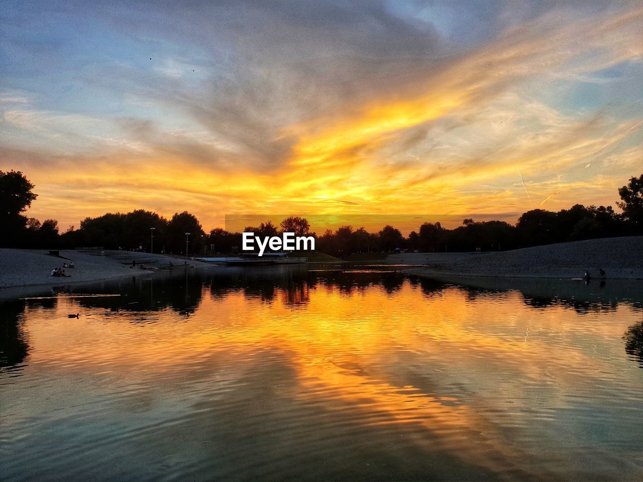 SCENIC VIEW OF LAKE AGAINST ROMANTIC SKY