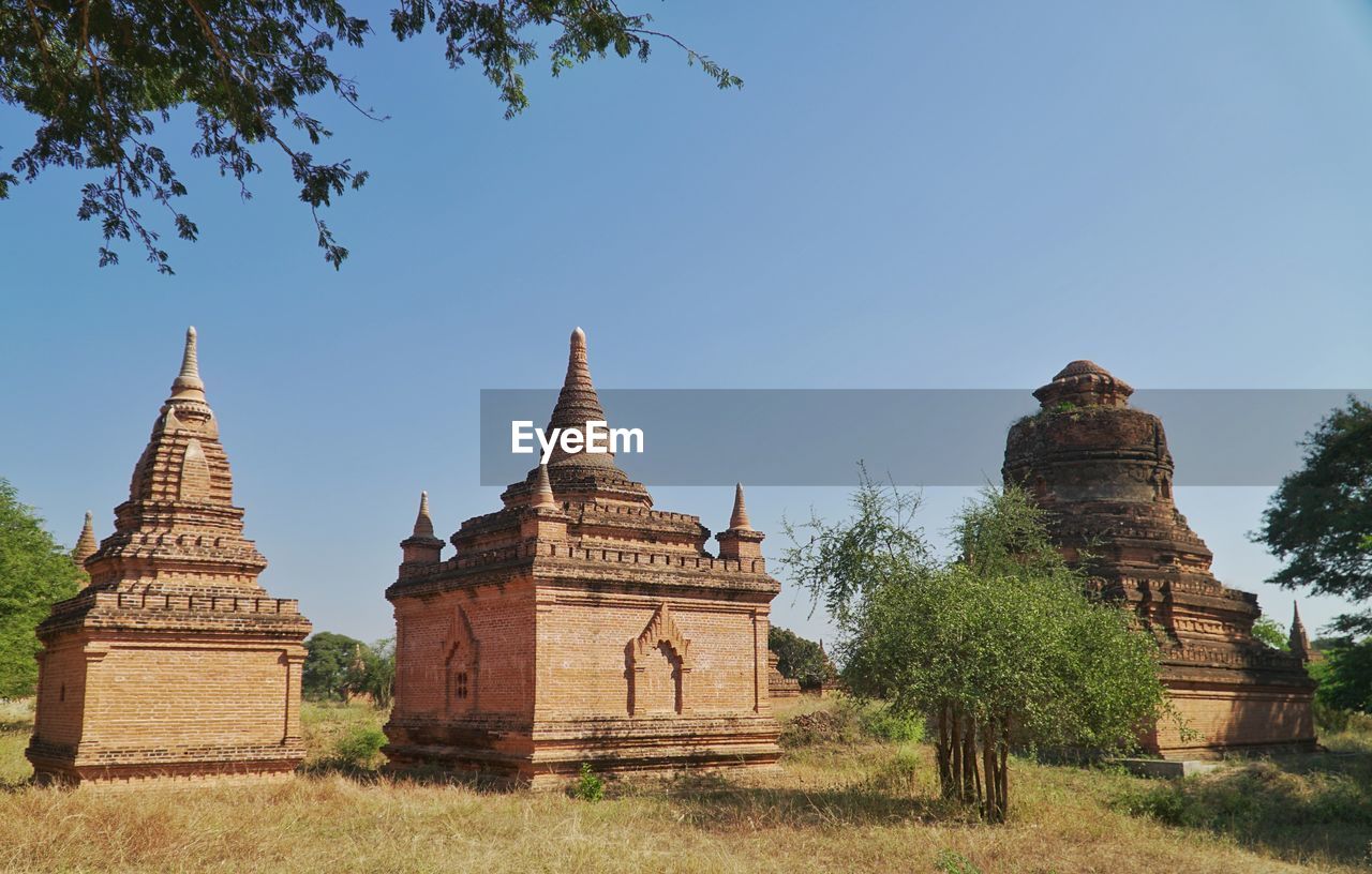 TEMPLE AGAINST BUILDING