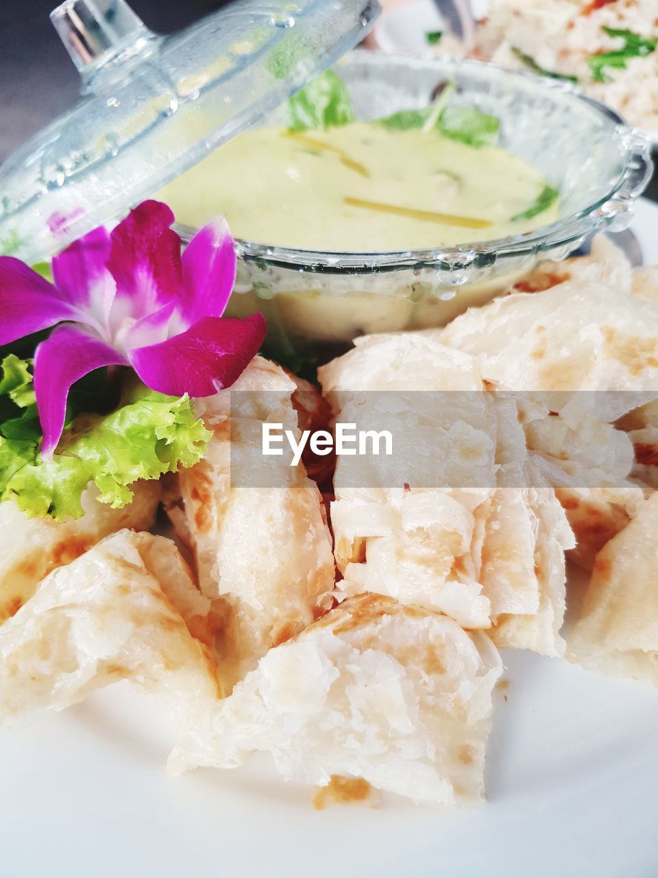 CLOSE-UP OF FOOD SERVED ON TABLE