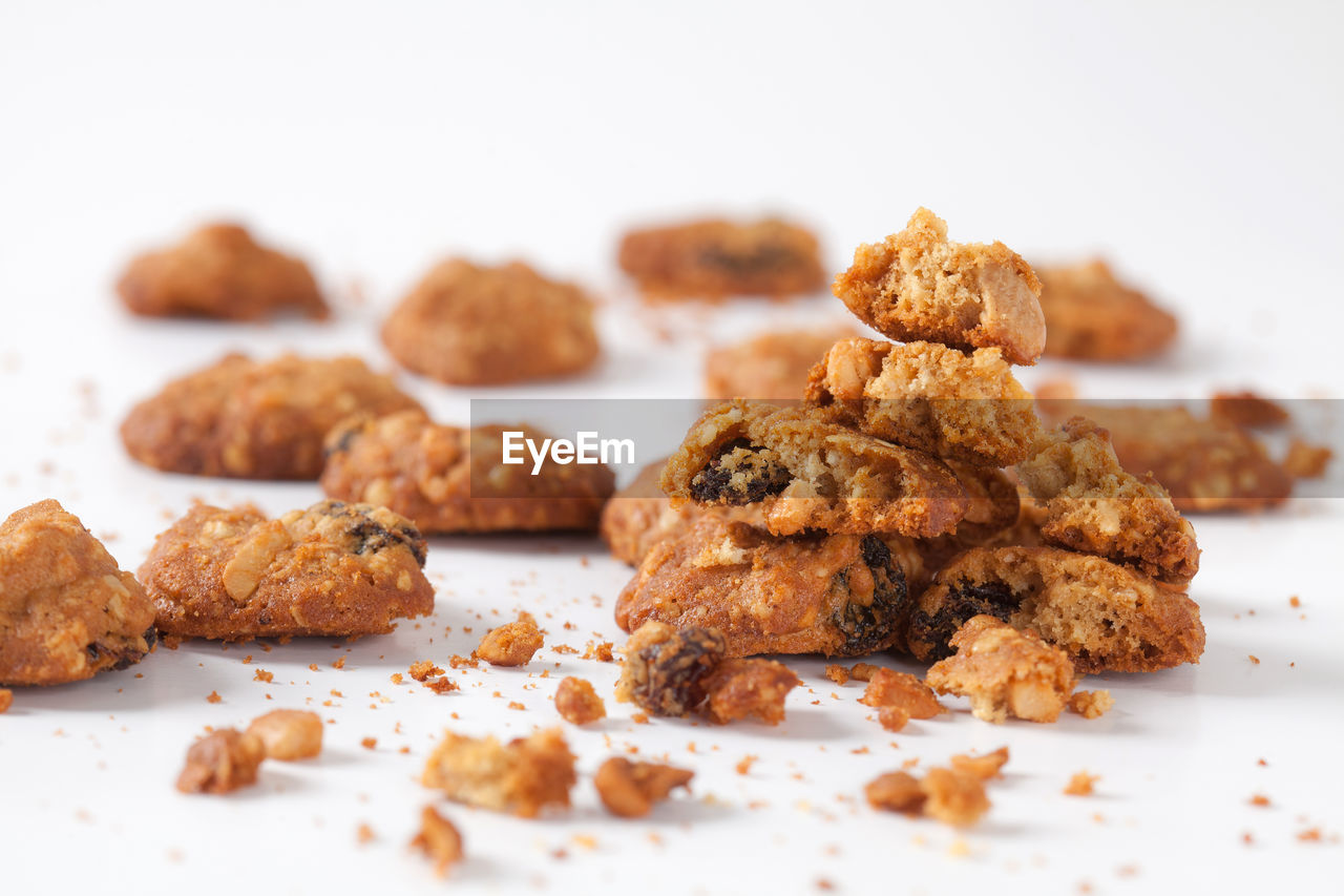 CLOSE-UP OF COOKIES ON WHITE BACKGROUND