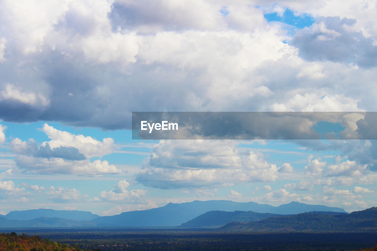 SCENIC VIEW OF LAND AND MOUNTAINS AGAINST SKY