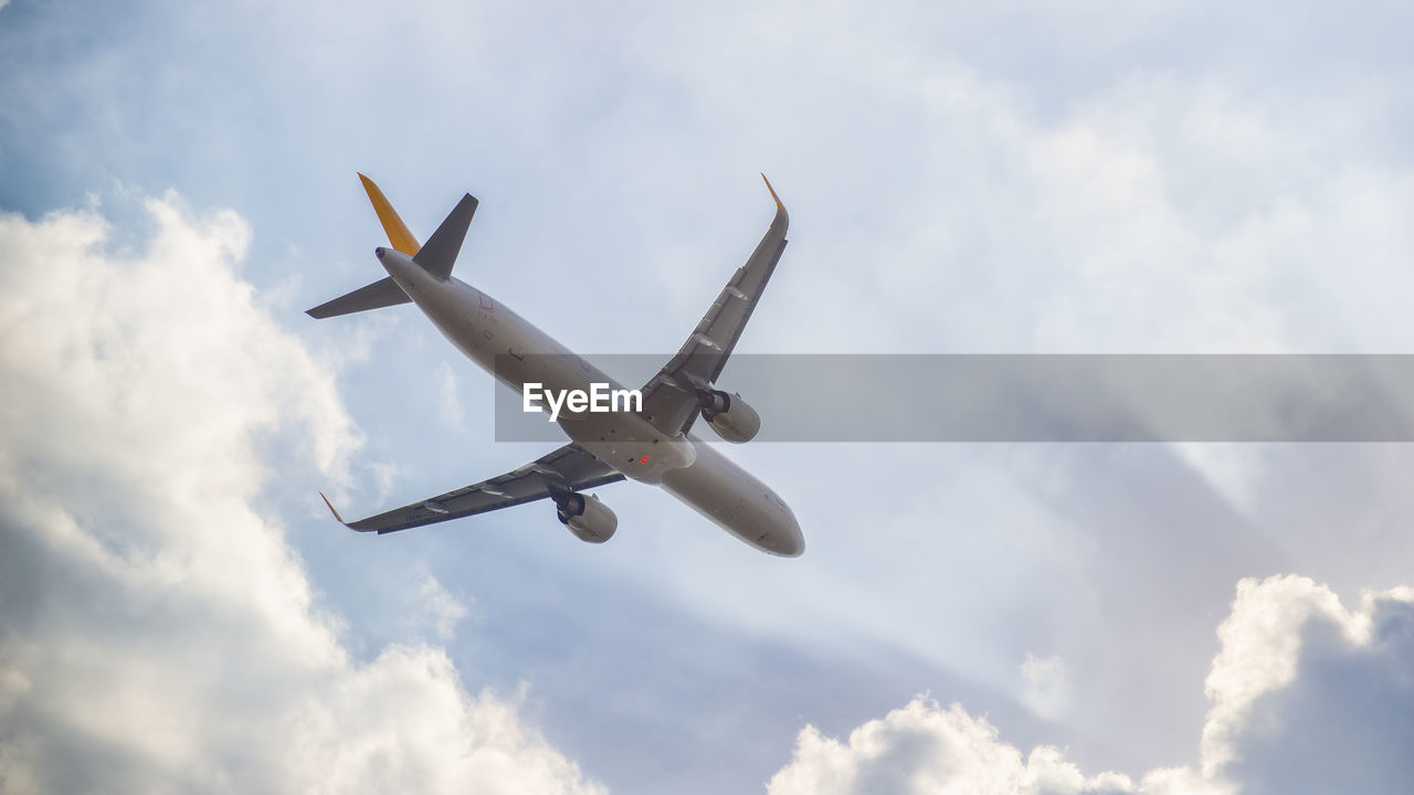 Airplane flying in the spring taking off from italy