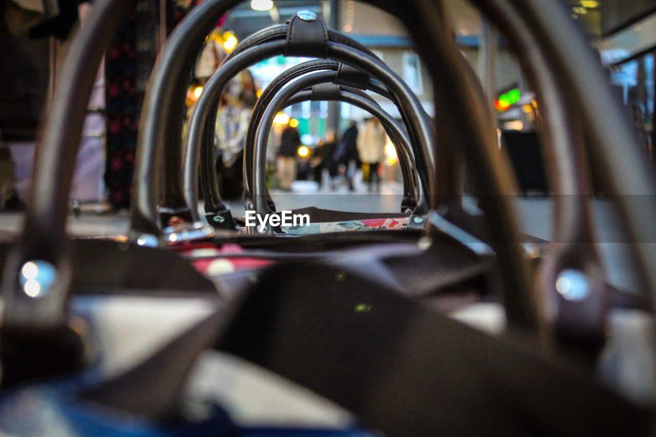 CLOSE-UP OF VINTAGE CAR ON SIDE-VIEW MIRROR