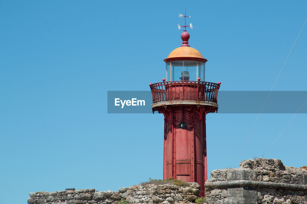 Low angle view of lighthouse against clear sky