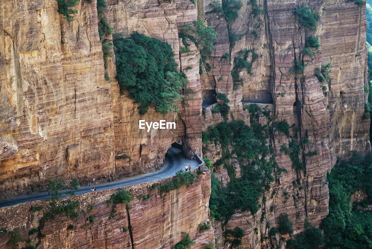 High angle view of road and tunnel on rocky mountain