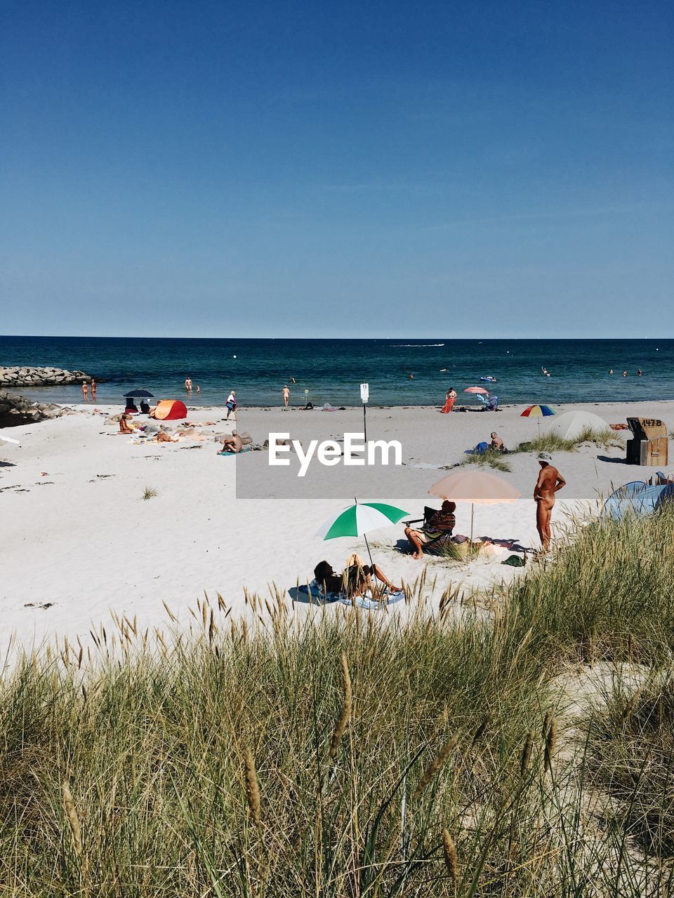 GROUP OF PEOPLE ON BEACH