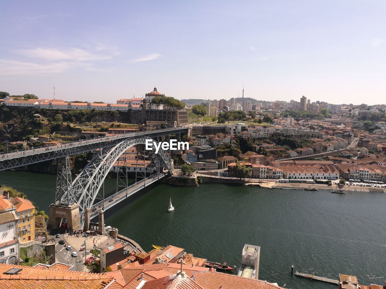 HIGH ANGLE VIEW OF CITY AT RIVERBANK