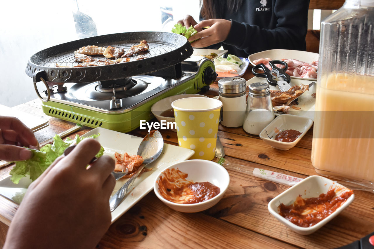 HIGH ANGLE VIEW OF MEAL SERVED ON TABLE