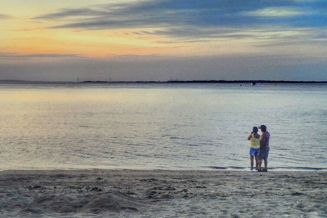 SCENIC VIEW OF SEA DURING SUNSET