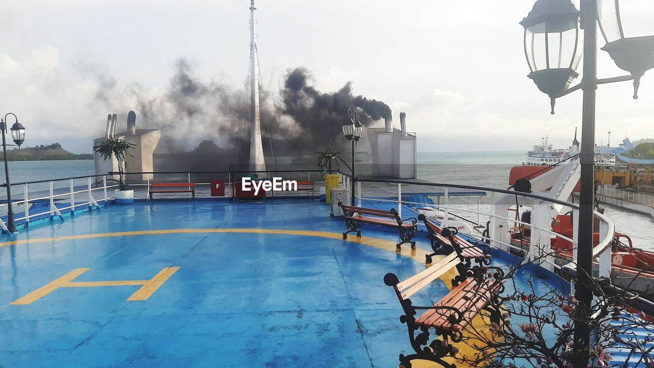 PANORAMIC VIEW OF SHIP AGAINST SKY