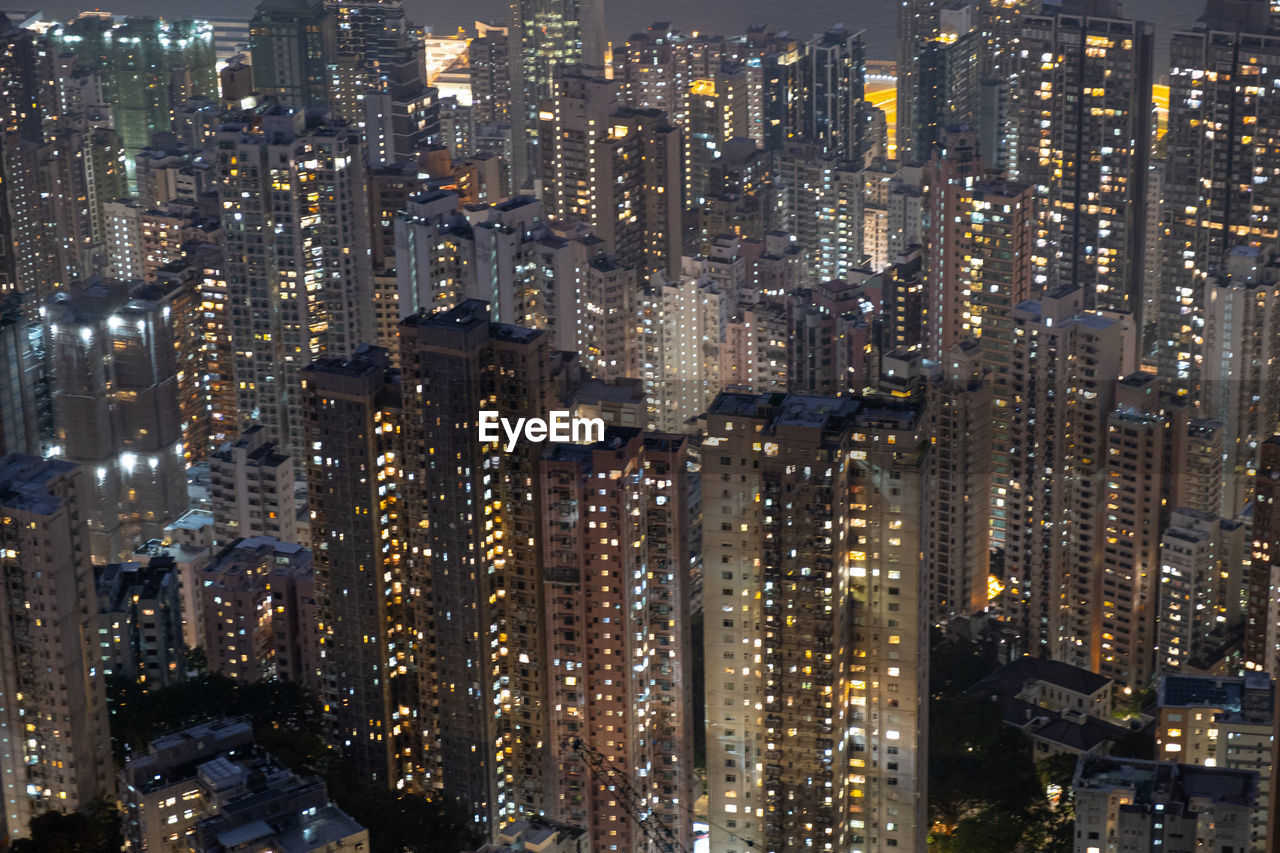 aerial view of illuminated cityscape at night