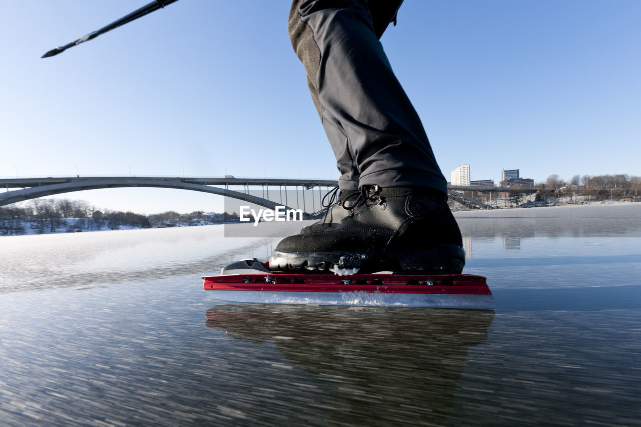 Man ice skating, low section