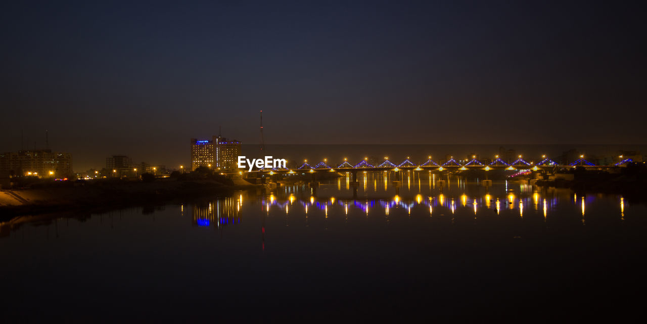 ILLUMINATED CITY AT NIGHT