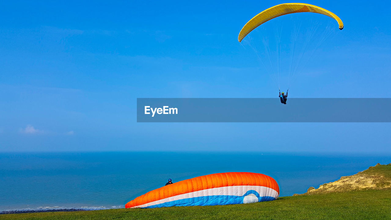 KITE FLYING OVER BEACH