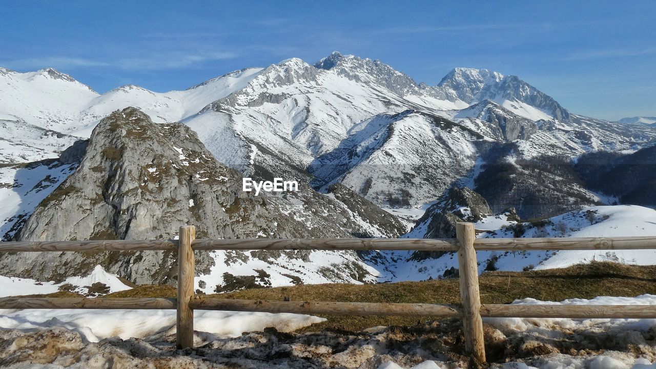 Snow covered mountains against sky