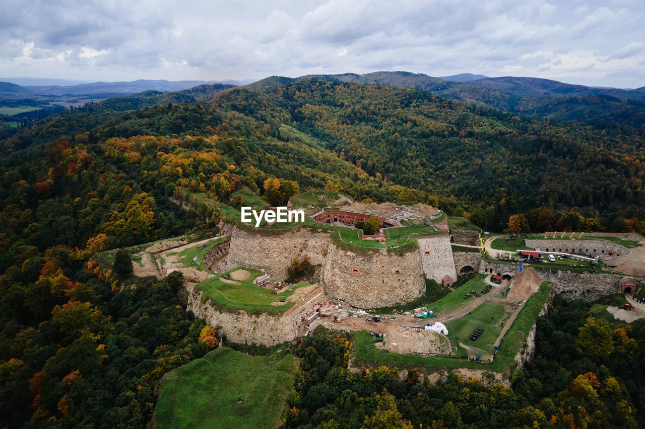 Srebrna gora fortress and sudety mountains at autumn season, aerial drone view