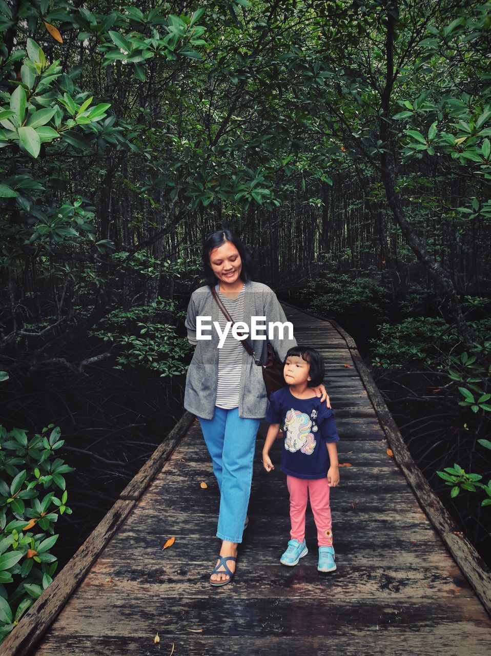 Enjoying walking in the mangrove forest with my baby girl