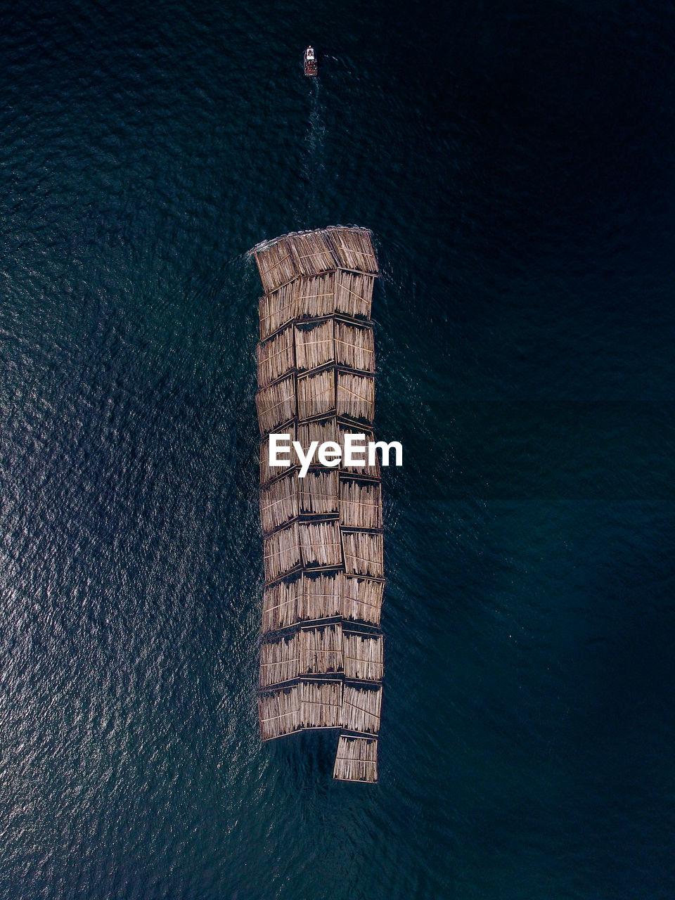 Aerial view of wooden raft in sea
