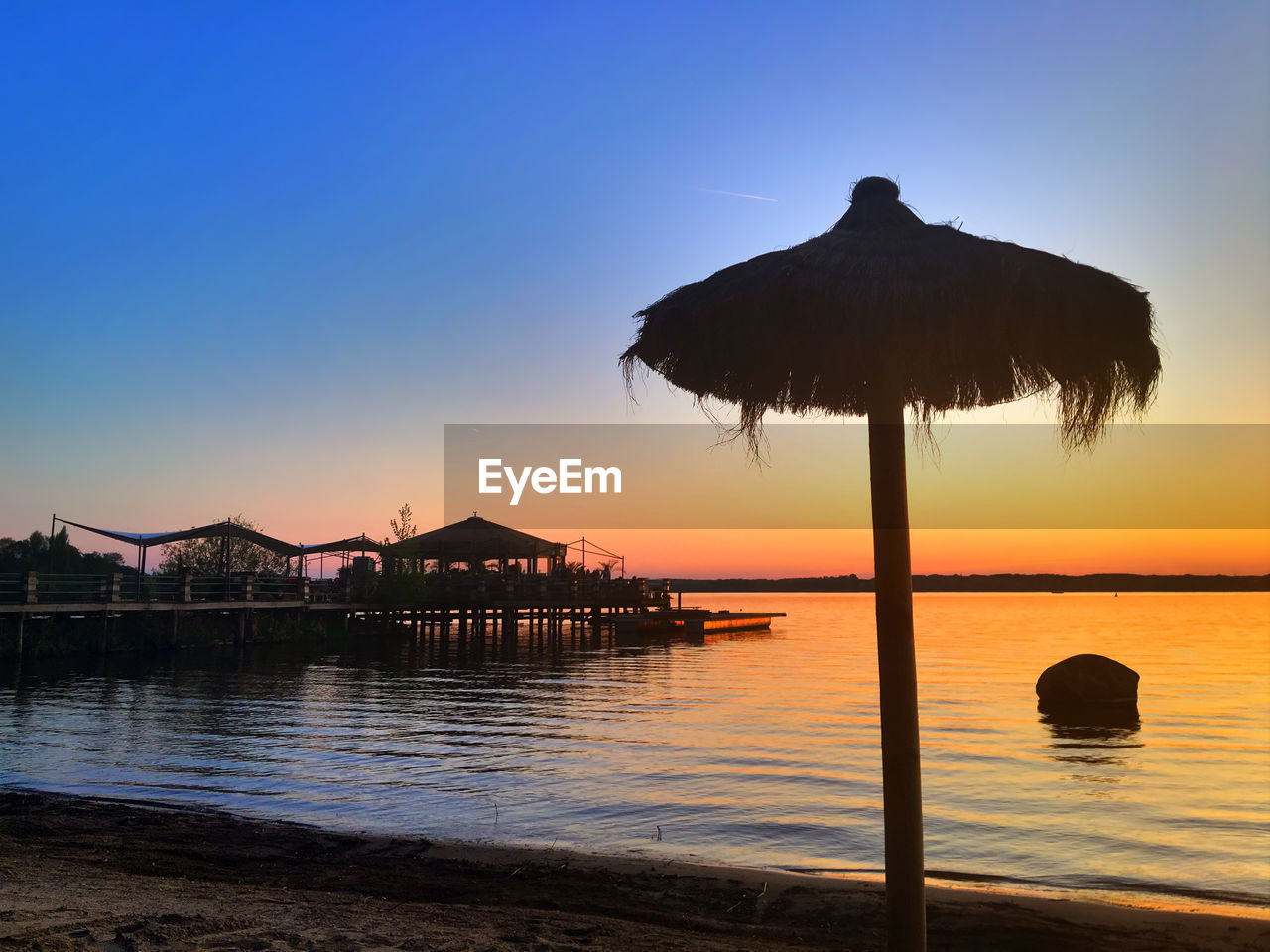 Scenic view of sea at sunset