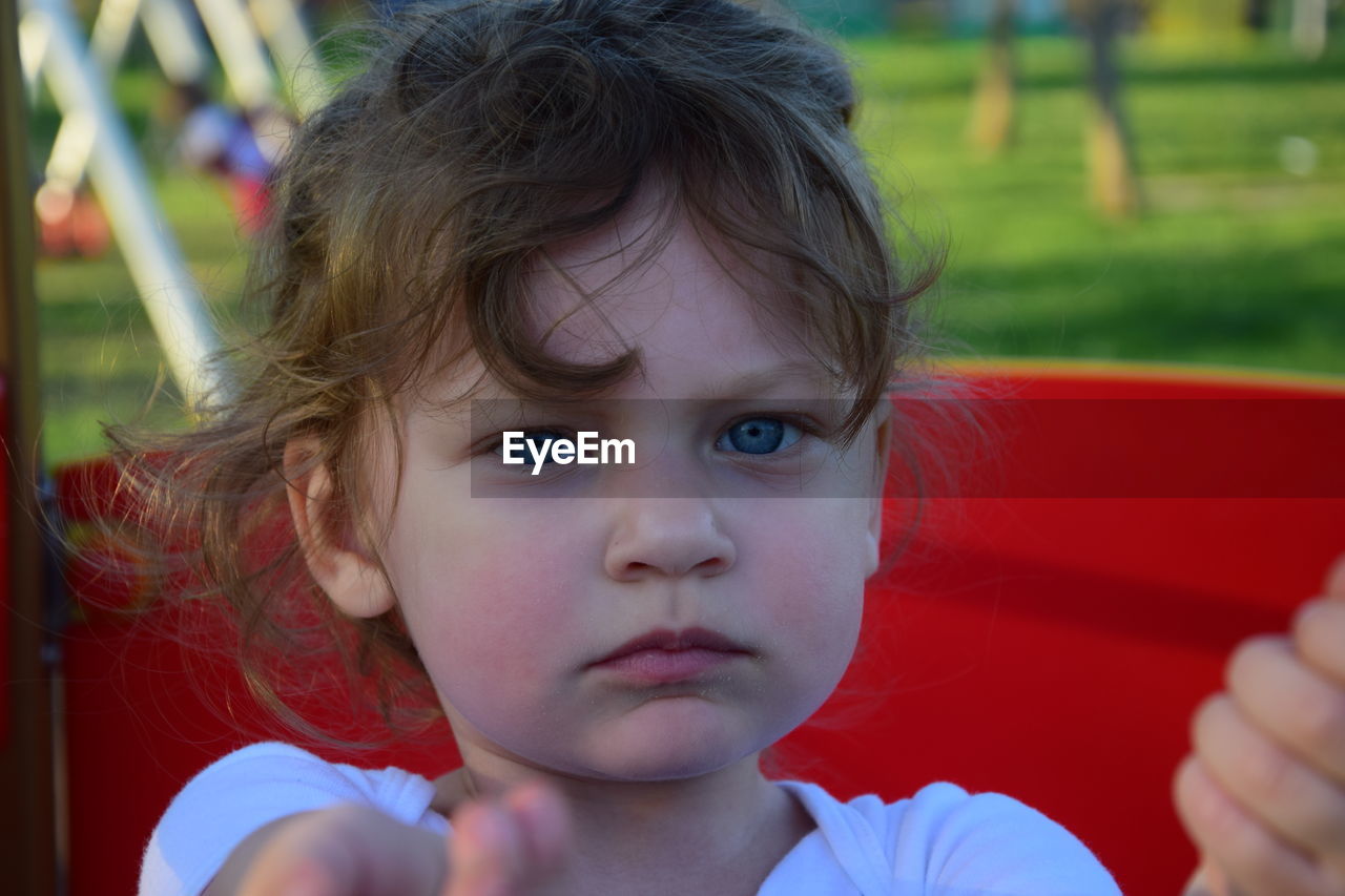 Portrait of cute girl playing on playground