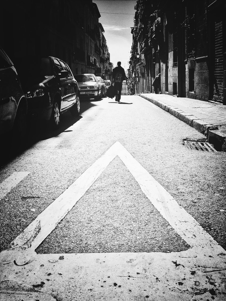 WOMAN WALKING ON ROAD