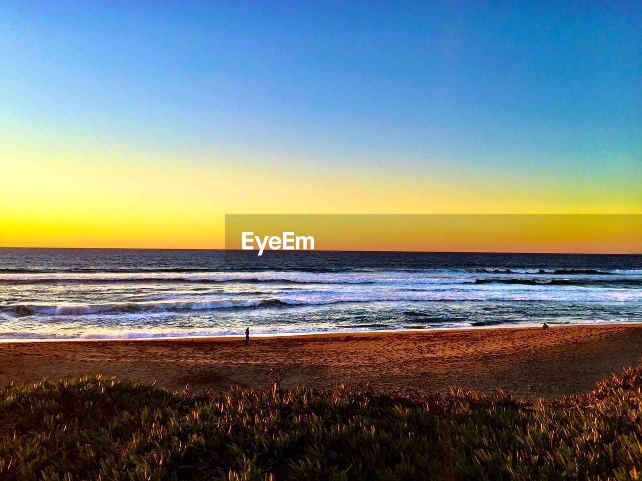 VIEW OF SEA AT SUNSET