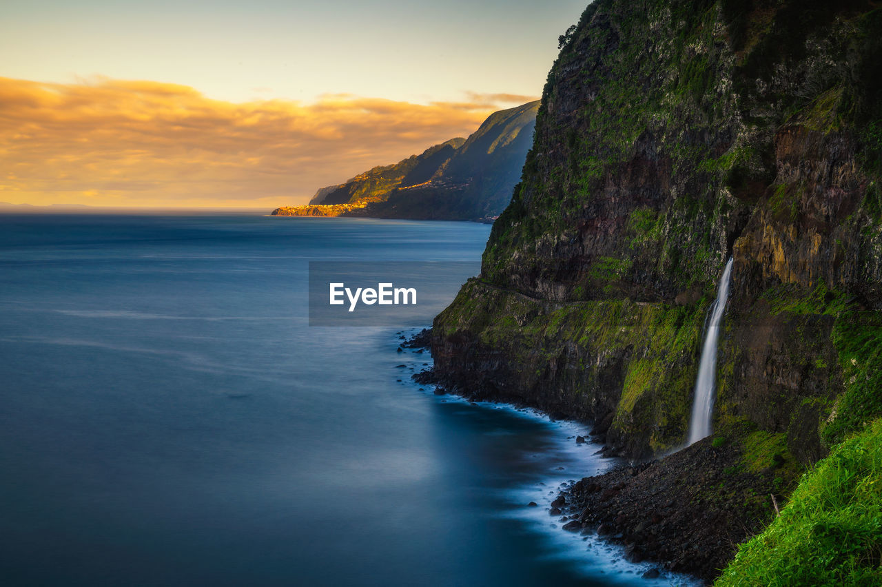 scenic view of sea against sky at sunset