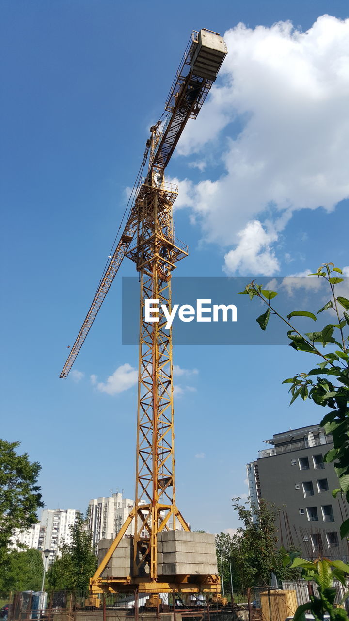 Low angle view of construction crane