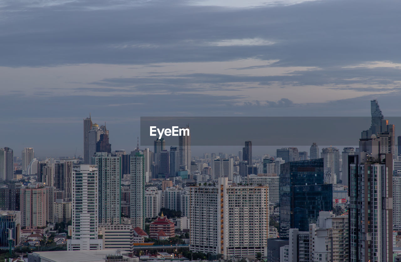 SKYSCRAPERS AGAINST SKY IN CITY