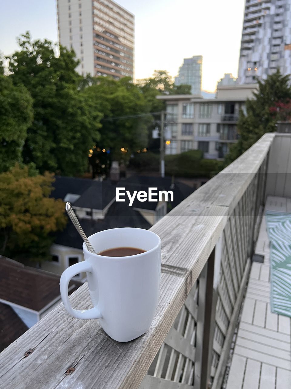 Low angle view of coffee cup on balcony