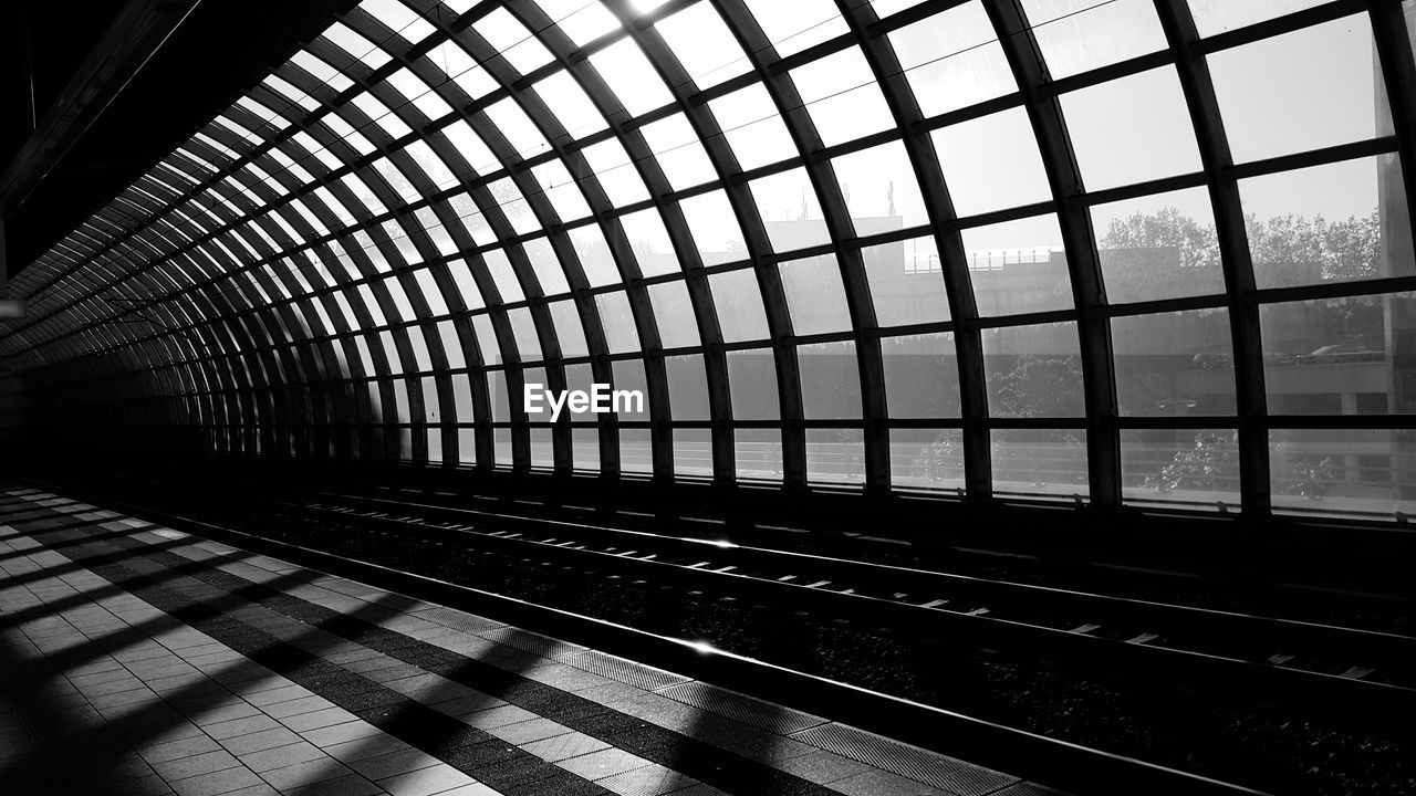 RAILROAD STATION PLATFORM SEEN THROUGH TRAIN