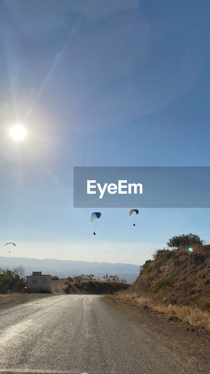 SCENIC VIEW OF LANDSCAPE AGAINST BRIGHT SKY